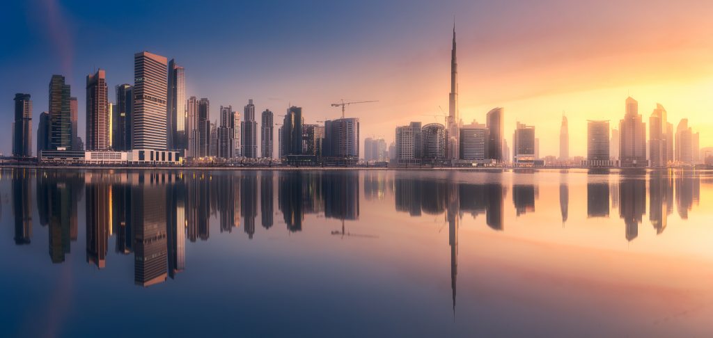 Mystical,Panoramic,View,Of,Dubai,Business,Bay,With,Purple,Sunrise,